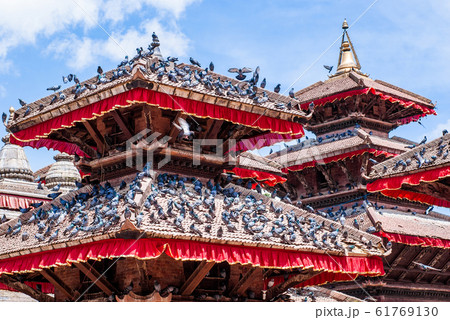 Pigeons on temple roofs at Kathmandu Durbar Square Pigeons on temple roofs at Kathmandu Durbar Square 61769130
