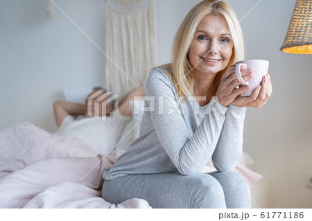 Morning tea for woman in bedroom stock photo 61771186