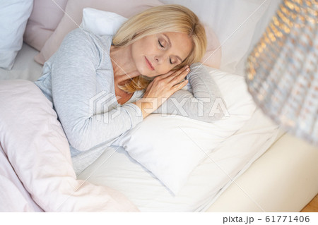 Woman sleeping at home alone stock photo 61771406