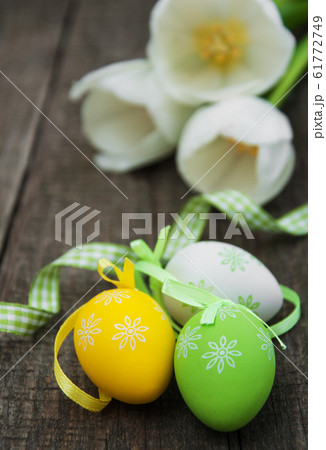 Easter eggs and tulips 61772749