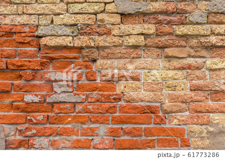 Crumbling Bricks Wall 61773286