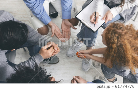 Diverse people sharing their problems at group therapy session, top view Diverse people sharing their problems at group therapy session, top view 61774776