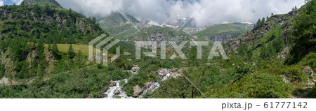 Trekking in Italian Alps mountain 61777142