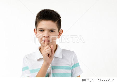 cute little boy in t-shirt asking to be quiet cute little boy in t-shirt asking to be quiet 61777217