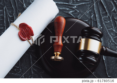 Notary's public pen and stamp on testament and last will. Notary public 61780516