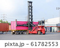 Container handlers are loading containers into 61782553