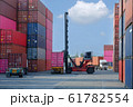 Container handlers are loading containers into 61782554