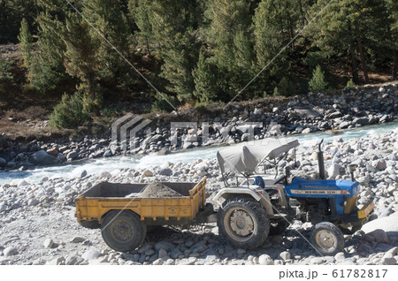 Construction site dumper Dump truck Lorry on riverbank Construction site dumper Dump truck Lorry on riverbank 61782817