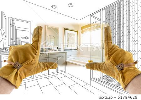 Male Contractor Hands Framing Completed Section of Sketch Blueprints Male Contractor Hands Framing Completed Section of Sketch Blueprints 61784629