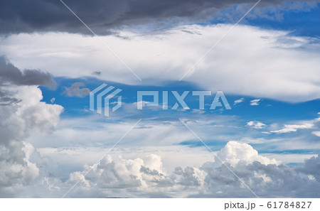 Beautiful white clouds against the blue sky. Beautiful white clouds against the blue sky. 61784827