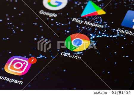 the Google Chrome logo on the smartphone screen close-up. the Google Chrome logo on the smartphone screen close-up. 61791454