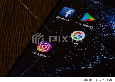 the google logo on the smartphone screen close-up. the google logo on the smartphone screen close-up. 61791456