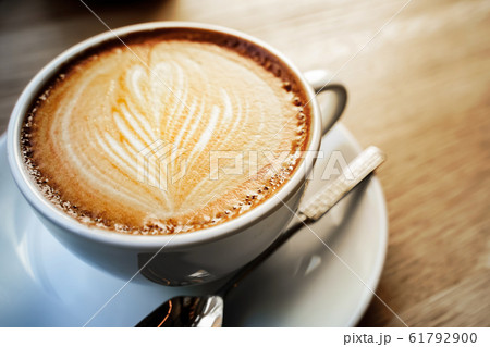 cup of the latte art coffee with warm light cup of the latte art coffee with warm light 61792900