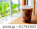 cup of the coco or cacao frappe on the table 61792903