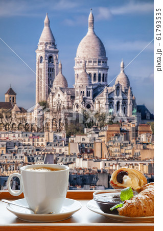 Paris coffee with croissants against Sacre Coeur basilica in France 61793535