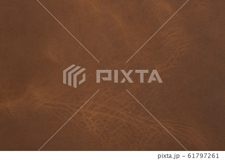 Old brown leather texture. Can be used as background in art or design projects. Old brown leather texture. Can be used as background in art or design projects. 61797261