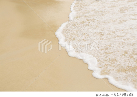 Tropical beach background with soft wave and sand Tropical beach background with soft wave and sand 61799538