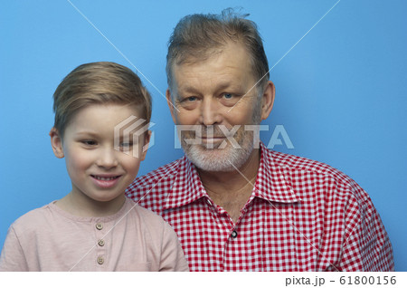 Portrait of cute positive grandfather and grandson Portrait of cute positive grandfather and grandson 61800156