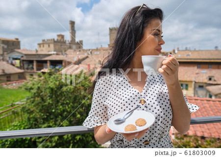 attractive woman tourist in old italian town attractive woman tourist in old italian town 61803009