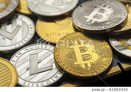 Bitcoin coins lie on top of each other Bitcoin coins lie on top of each other 61803450