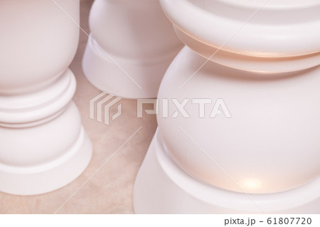 White decoration columns base, interior fragment 61807720