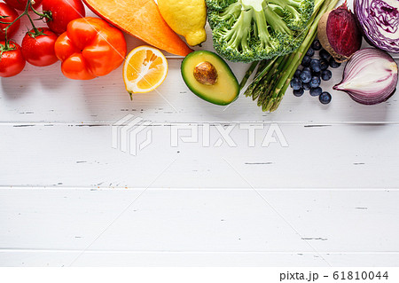 Rainbow colors vegetables and berries  61810044