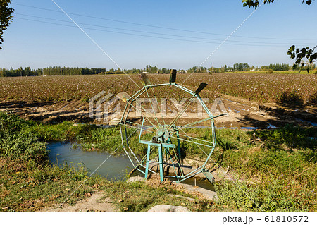Water turbine on a cotton field. Water turbine on a cotton field. 61810572