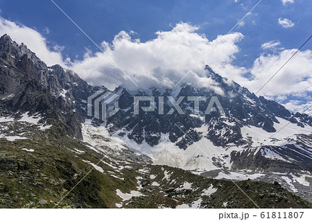 Aiguille du Midi among the clouds. Mont Blanc 61811807