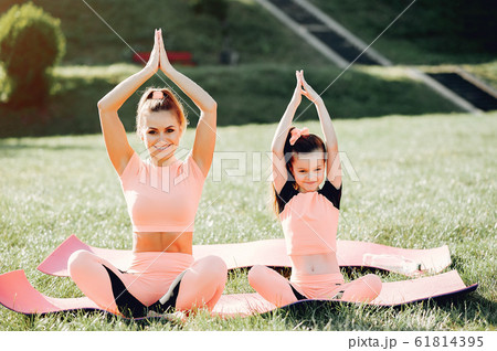 Sports family in a summer park 61814395