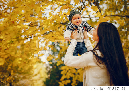 Family with little son in a autumn park 61817191