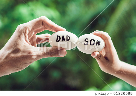 Eggs with inscriptions father and son. Problems between father and son concept 61820699