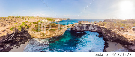 Landscape over Broken Beach in Nusa Penida, Indonesia Angel's BillaBong Beach. Popular tourist Landscape over Broken Beach in Nusa Penida, Indonesia Angel's BillaBong Beach. Popular tourist 61823528