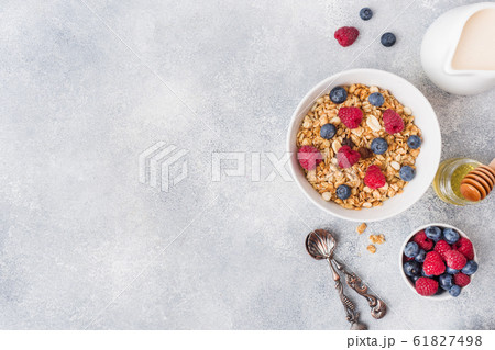 Healthy breakfast. Fresh granola, muesli with 61827498