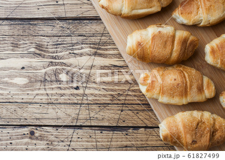 Croissants with chocolate filling on wooden 61827499