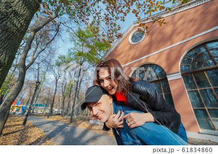 Young beautiful couple and their labrador in the 61834860