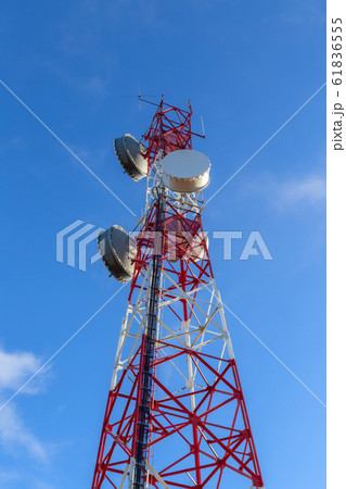 A modern tower antenna for broadcasting telephone, television, and Internet signals. Against the sky. 61836555