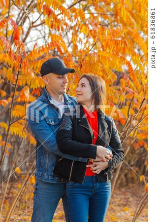 Happy couple in love on a background of yellow Happy couple in love on a background of yellow 61836861