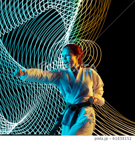 Creative sport and neon waves on dark neon lighted line background Creative sport and neon waves on dark neon lighted line background 61838152