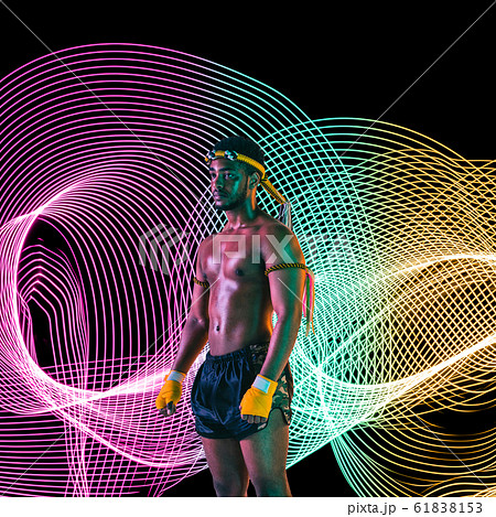 Creative sport and neon waves on dark neon lighted line background Creative sport and neon waves on dark neon lighted line background 61838153