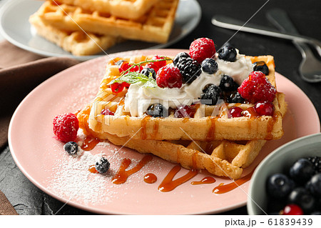 Beautiful composition with sweet waffles, space 61839439
