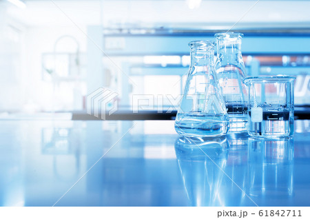 water in beaker and flask glass in chemistry laboratory 61842711