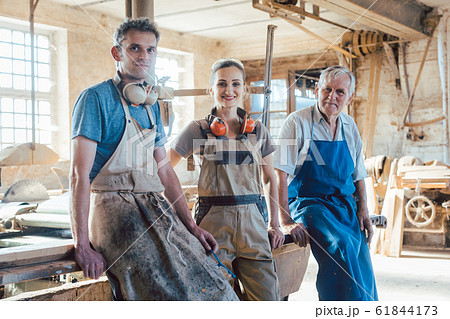 Carpenter family business with generations in the workshop Carpenter family business with generations in the workshop 61844173