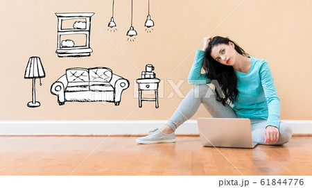 New apartment dream with woman using a laptop 61844776