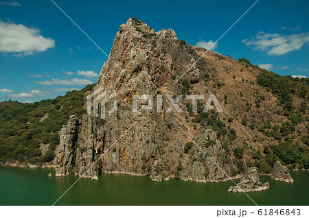 Valley with cliffs and the Tagus River at the Monfrague National Park Valley with cliffs and the Tagus River at the Monfrague National Park 61846843
