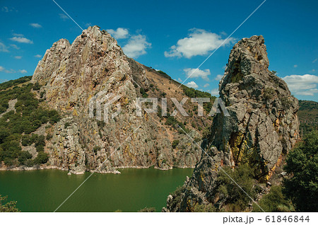 Valley with cliffs and the Tagus River at the Monfrague National Park Valley with cliffs and the Tagus River at the Monfrague National Park 61846844