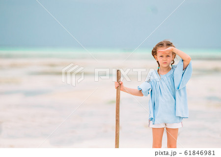 Happy girl enjoy summer vacation on the beach 61846981