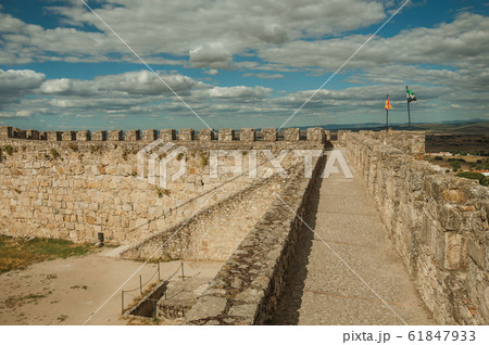 Pathway on top of stone wall at the Castle of Trujillo 61847933