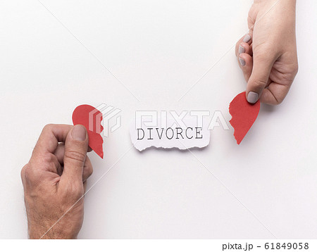 Couple, family hands holding broken heart on white Couple, family hands holding broken heart on white 61849058