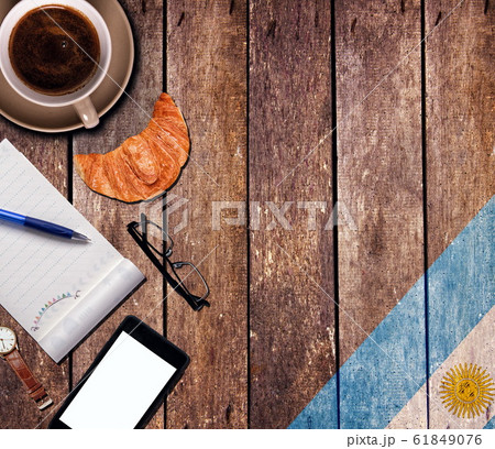 Coffee with the notepad and phone 61849076