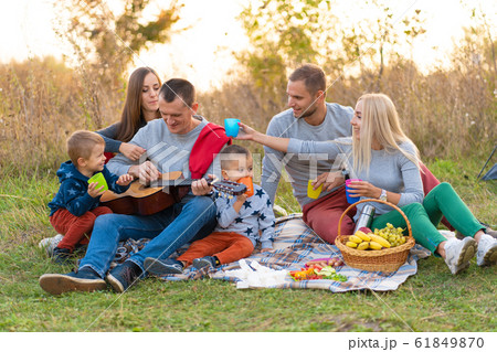 travel, tourism, hike, picnic and people concept - 61849870